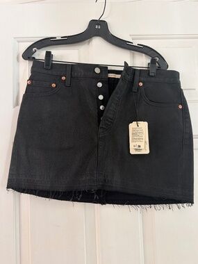 Denim coated Levi’s mini skirt